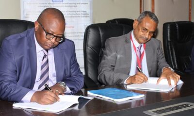 Charles Hinga (left) with Ramji Varsani.