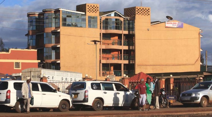 Residents outside a new hotel in Marsabit town.