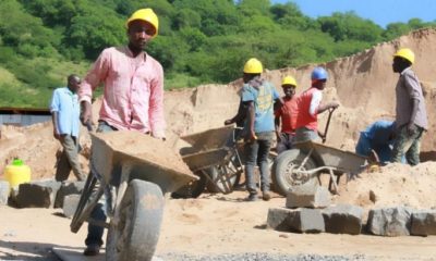 Workers harvesting sand in Makueni