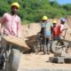 Workers harvesting sand in Makueni