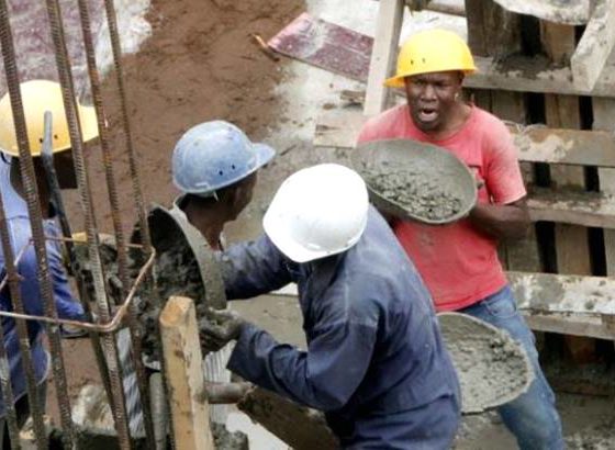 Workers build house
