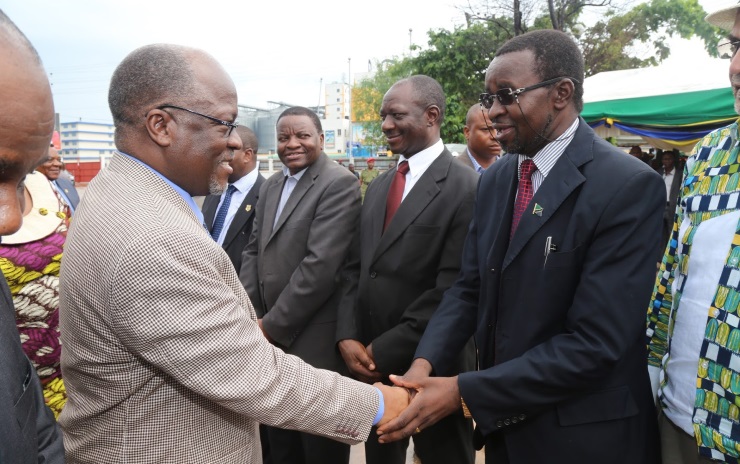 President John Magufuli (left) with Eng Patrick Mfugale