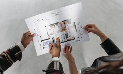 An architect briefs a client.