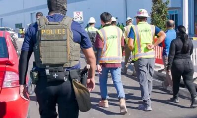 Workers detained during EV battery plant raid, Ellabell, GA, Sept. 4.