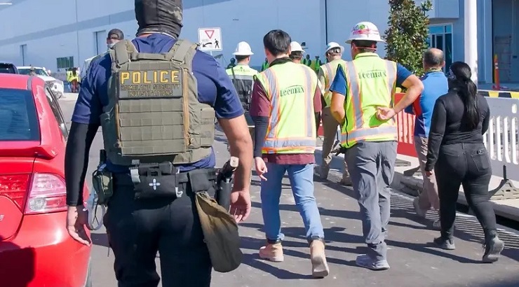 Workers detained during EV battery plant raid, Ellabell, GA, Sept. 4.