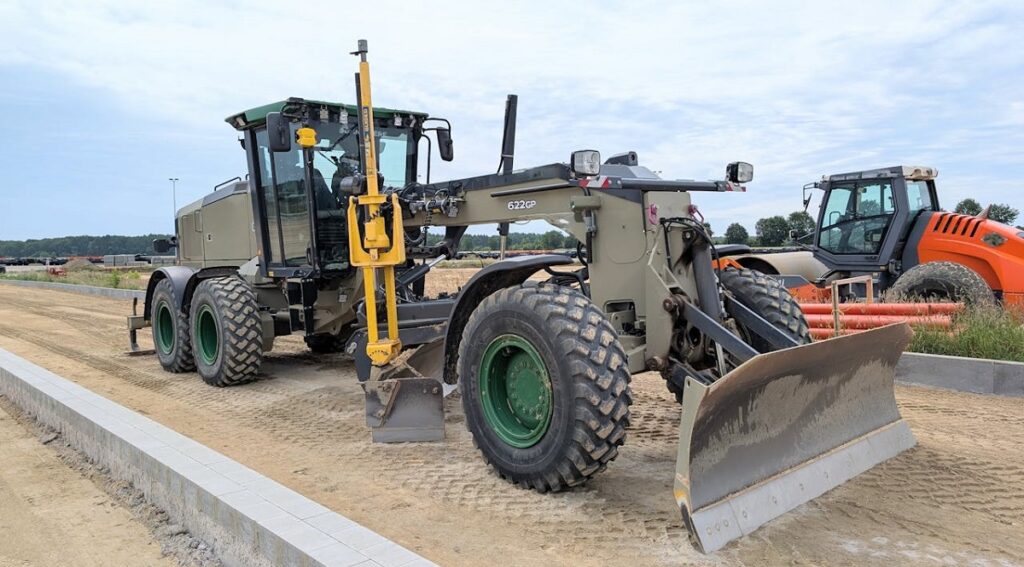 Graders at a worksite.