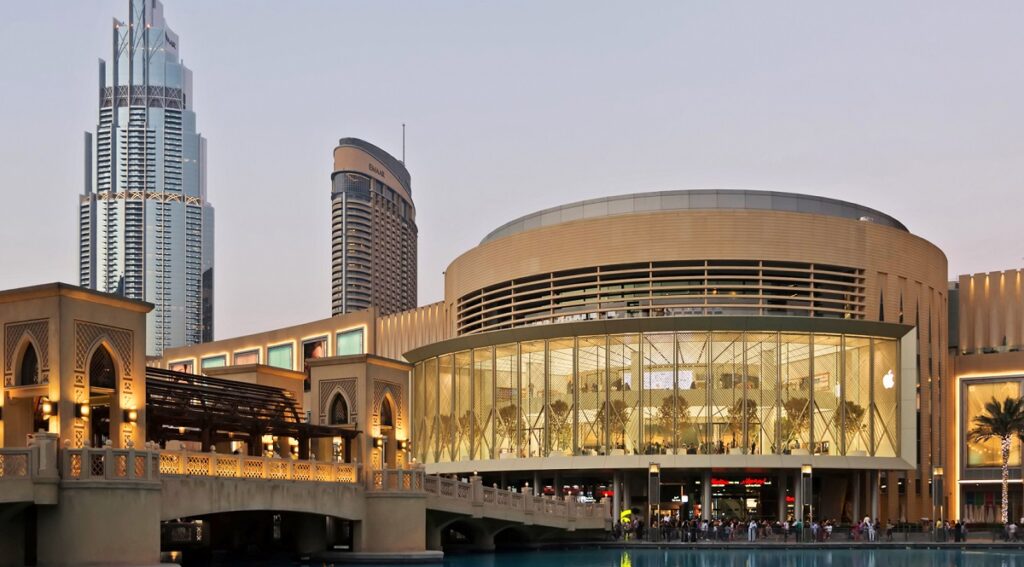 Exterior view of Dubai Mall with Burj Khalifa in the background.