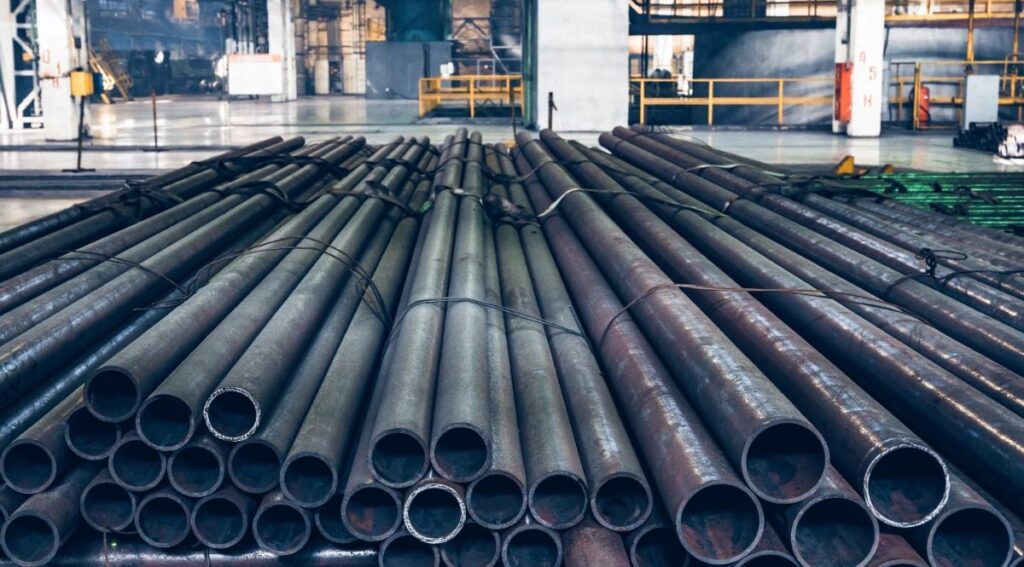 Stack of steel pipes at a factory