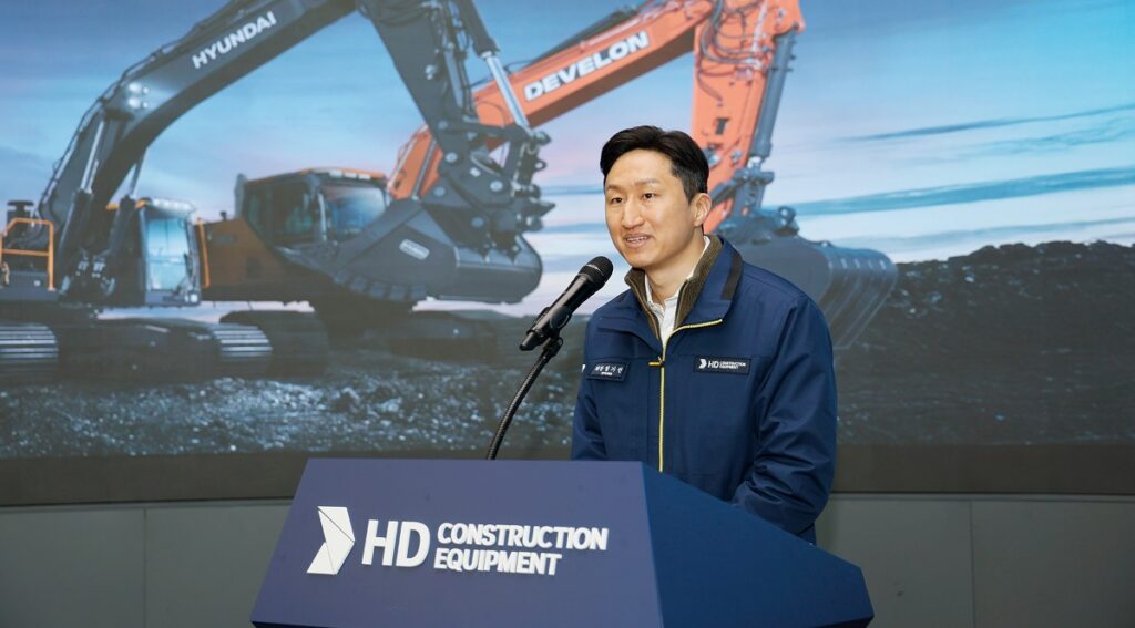 Develon and Hyundai excavators lined up, representing next-generation construction equipment.