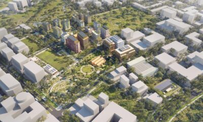 Architectural rendering of Bradfield City showing modern high-rise buildings, landscaped public spaces, and tree-lined streets.