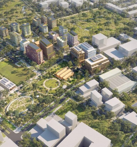 Architectural rendering of Bradfield City showing modern high-rise buildings, landscaped public spaces, and tree-lined streets.