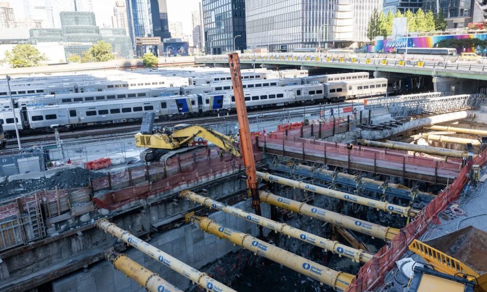 Construction workers performing support work at the Hudson Tunnel Project site.