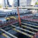 Construction workers performing support work at the Hudson Tunnel Project site.