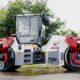 The Dynapac CC7000 VI asphalt roller on a paved roadway.