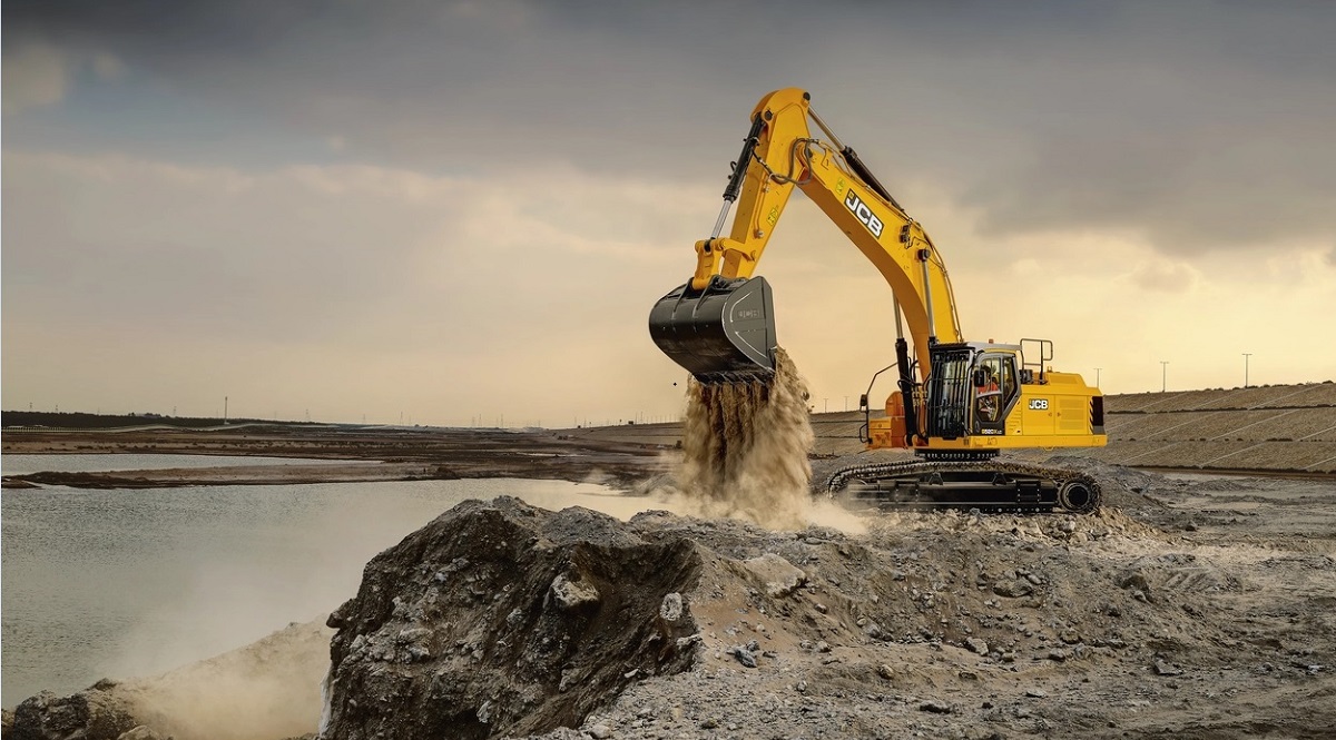 JCB 520X crawler excavator working on a construction site.